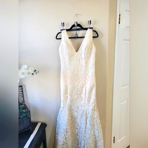 Lace mermaid style wedding gown with chapel train